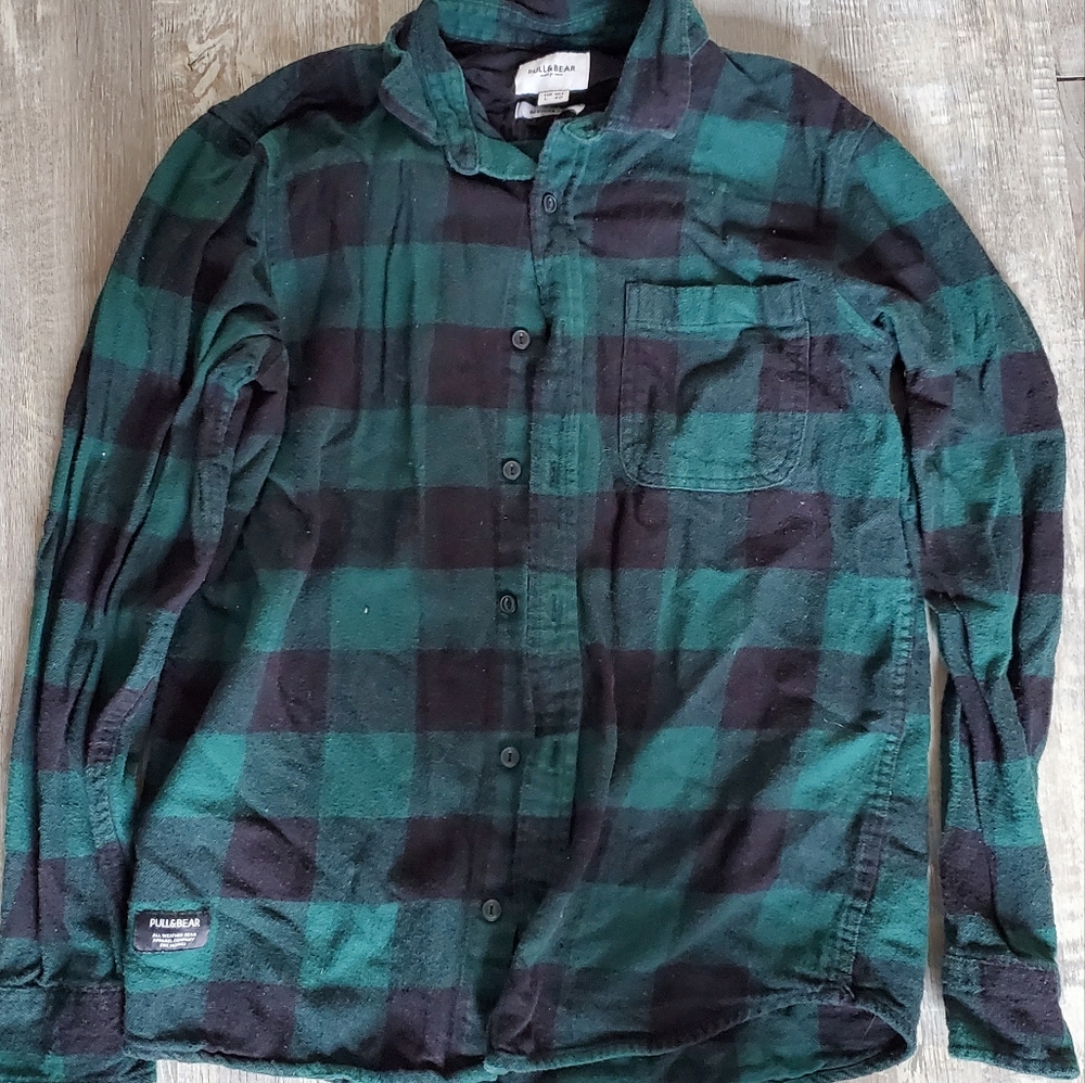 Green and black checkered flannel shirt